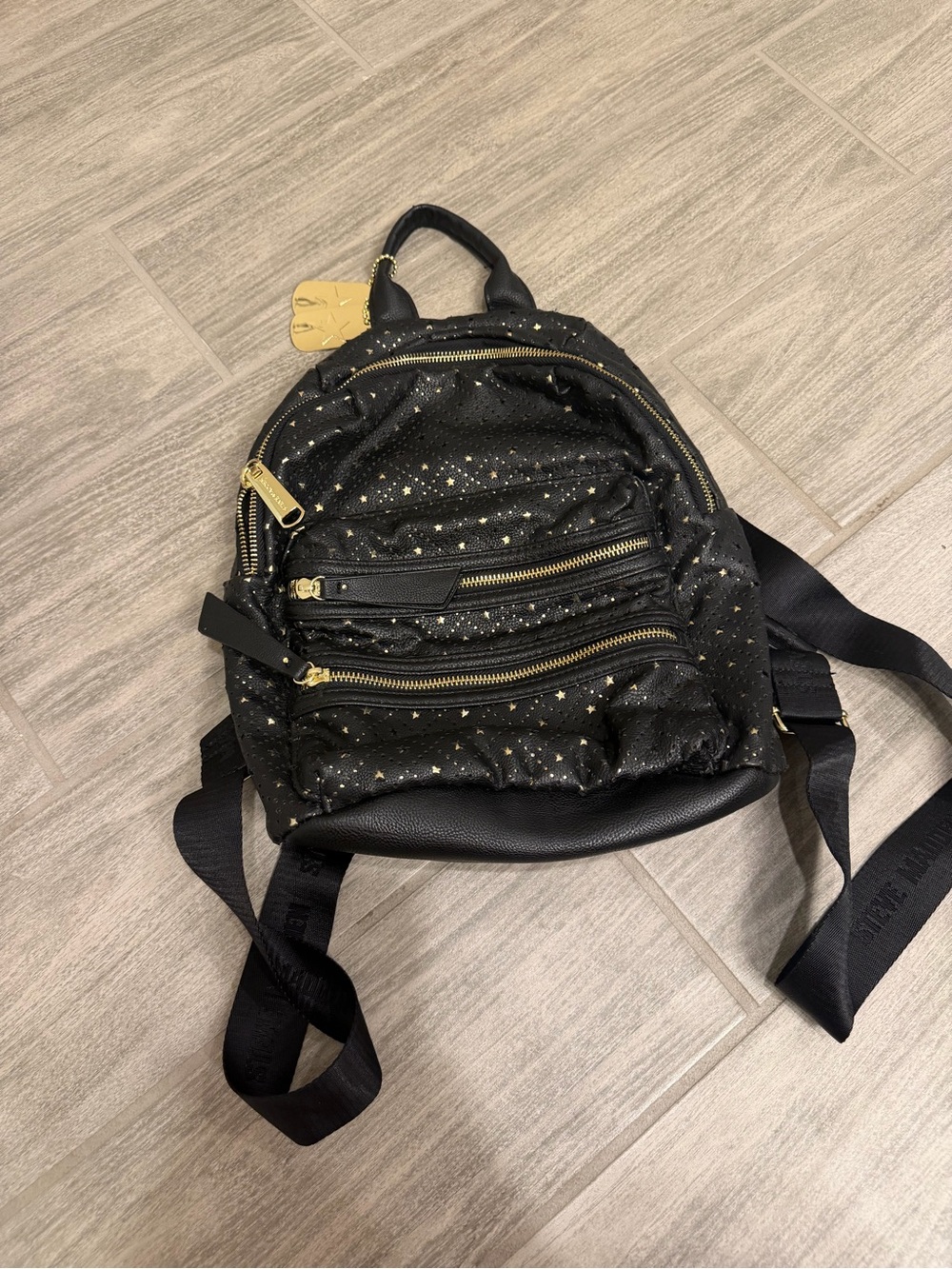 Steve Madden Black Mini Backpack with Gold Star Accents
